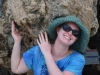 Melissa holding up a rock (but not really!)